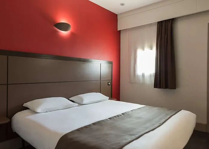 מלון Confort Le Moulin Rouge 3*